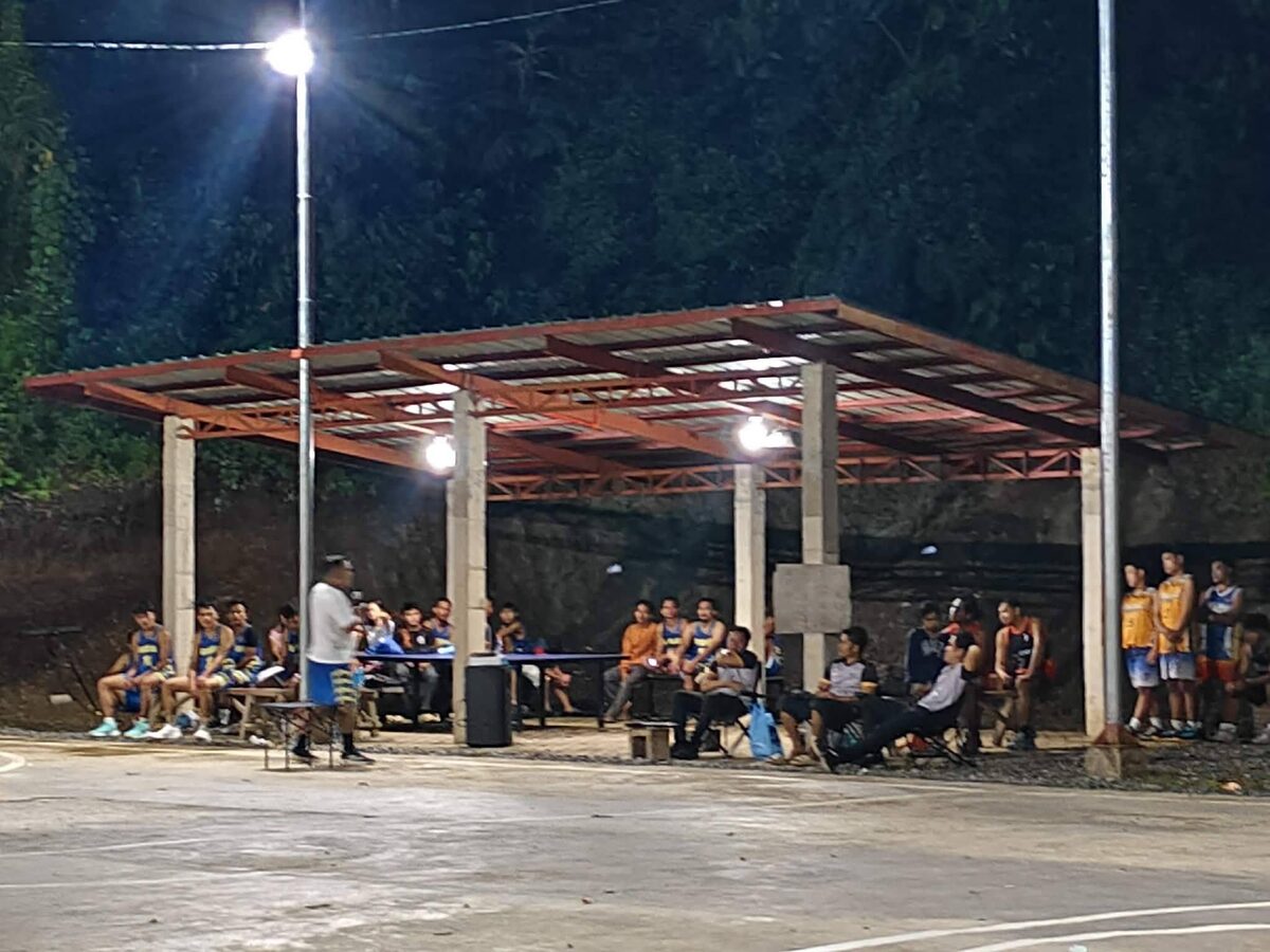 A gospel message preached to basketball players at the court in Alicia